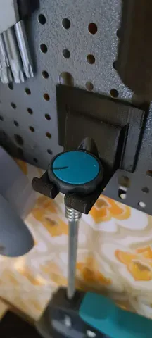 Pegboard holder for wolfcraft silicone gun