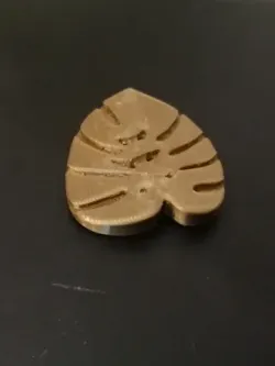 Monstera leaf button