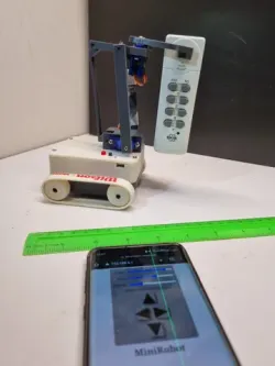 MiniBot - a toy robot with arm for Office fun