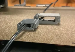 Small hinged cable clip