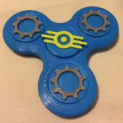 Fidget Tri-Spinner with Themed Bearing Caps