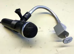 Action cam and gaming mic mount for an IKEA Kvart lamp stem.