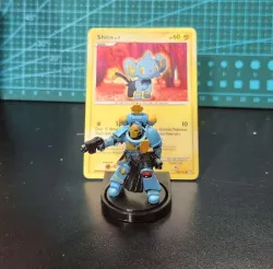 display stand for 32mm base with Pokémon card