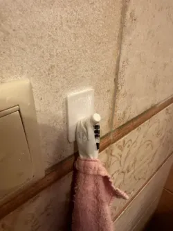 Towel hanger with sticker