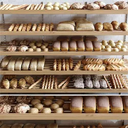 Bakery breads and pastries on shelves in 3D model