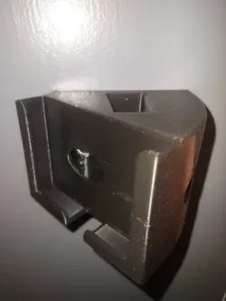 Wall mounted phone holder