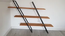 Angled hanging shelf.