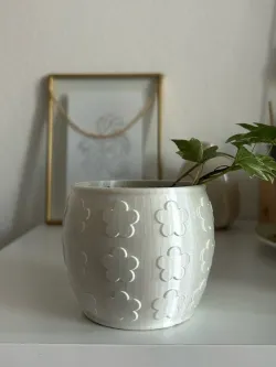 Planter with flower pattern