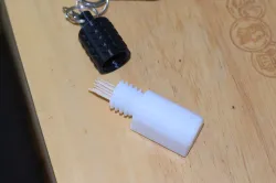 AE keychain capsule