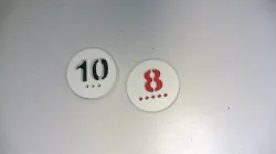 Catan Numbers with Colored Inserts