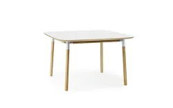 Dinner tables with metal based leg supports