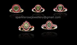 Statement Floral Gems Stone, two-tone Rings. A modified halo and split shank design .