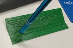 Aston Martin Logo (new style) and pen holder