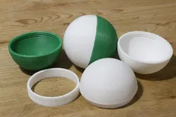 Half spheres joined with threaded ring
