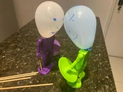Balloon head puppet fencing fighter