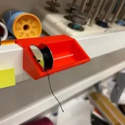 yarn spool holder for IKEA mosslanda shelf