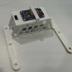 Adafruit Huzzah ESP8266 breakout board holder for Finbox