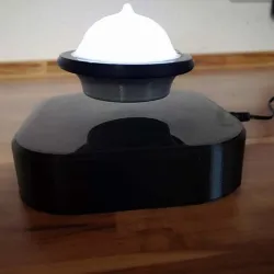 hovering illuminated UFO