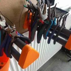 Small pliers holder for tool holder