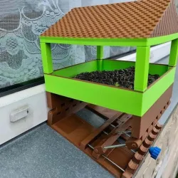 Bird feeder  with adjustable angle.