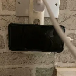 Mobile phone holder for charging