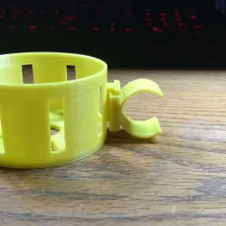 Silicone can holder for snow thrower