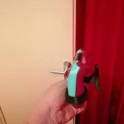 Wall-mounted joystick holder