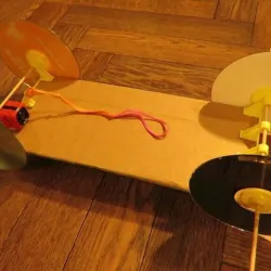 4 CD hubs for rubber band cars