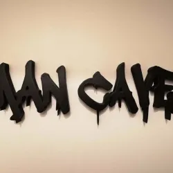 MANCAVE logo