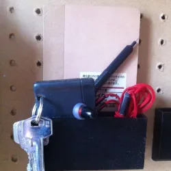Notebook and keys pegboard container