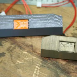 Short-side cover for D200 pause button
