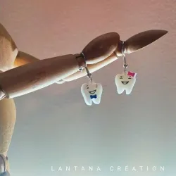 earrings tooth. Mr. and Mrs. Teeth