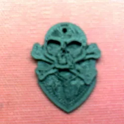 Skull and cross bones guitar pick