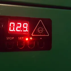 Timer board cover for UV curing chamber