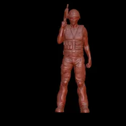 SOLDIER IN VEST IN POSE WITH M16
