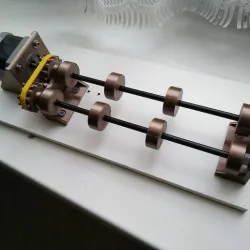 Rotating roller for laser engraver
