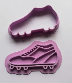 cutting soccer boot and marker