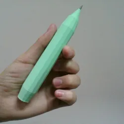 A pen attached when the lead of a pencil breaks