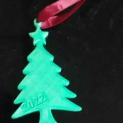 christmas tree ornament with spinning star print in place