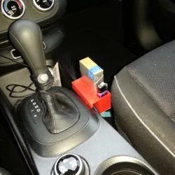 Cigarette caddy for a Fiat