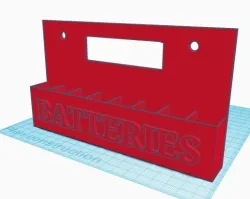 Wall-mounted battery holder