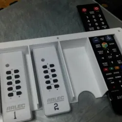 Under-shelf remote holder