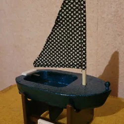 Paula the little toy-sailboat