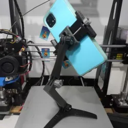 Cell phone holder/tripod