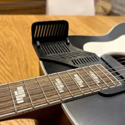Phone holder mount for a guitar