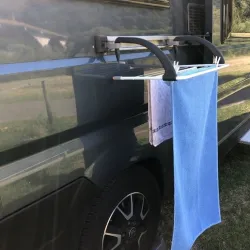 Clothesline holder for RV