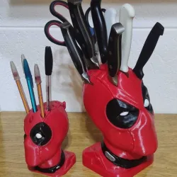 Deadpool. Knife holder plus pen.