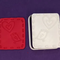 Heart bird cutout with heart