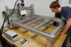 Free CNC mill plans (also wide format 3D printer gantry design)