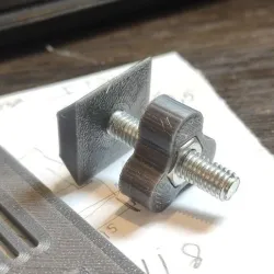 Hinge clamps for CNC machine table